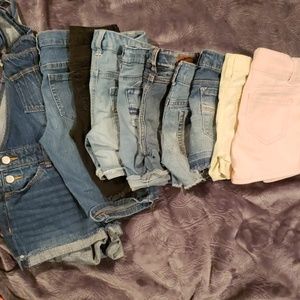 Lot of size 8 shorts and overall.
